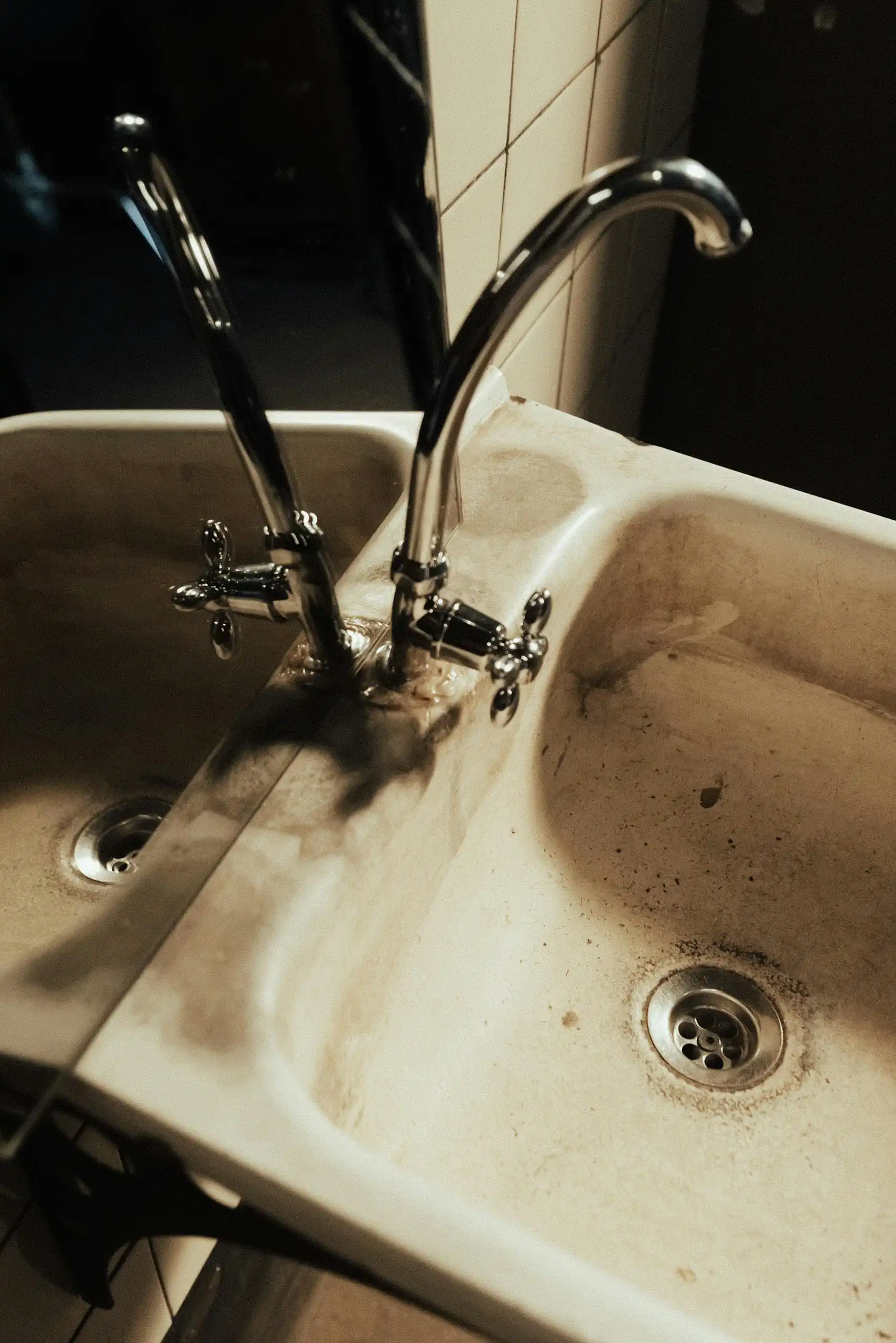 stained-sink-and-faucet